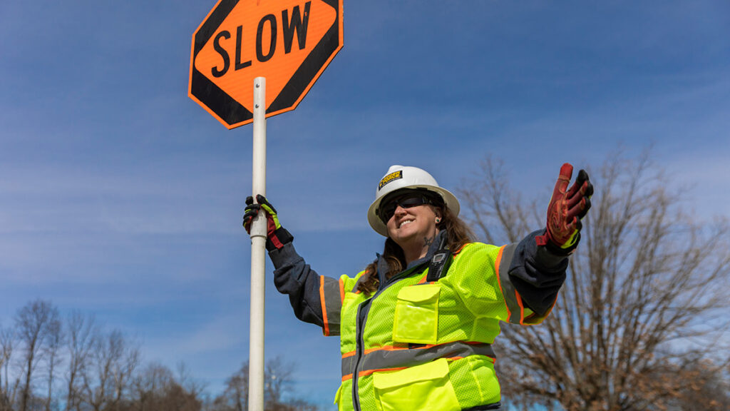 photo of Carrie in Flagger Force PPE flagging