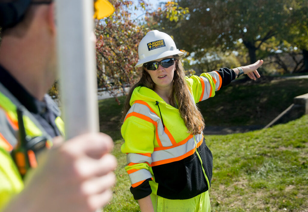 Employee Spotlight: Kristin talking with employee on site