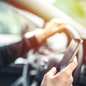 Distracted Driving: Causes and Cures