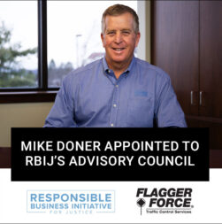 Mike Doner sitting at his desk. The Responsible Business Initiative for Justice and Flagger Force logos are included at the bottom of the image.
